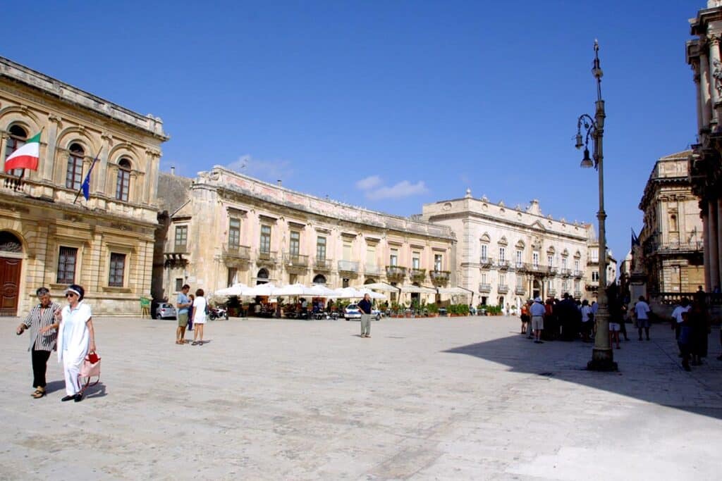 A large public square in front of some administration buildings on Ortigia Island, Syracusa