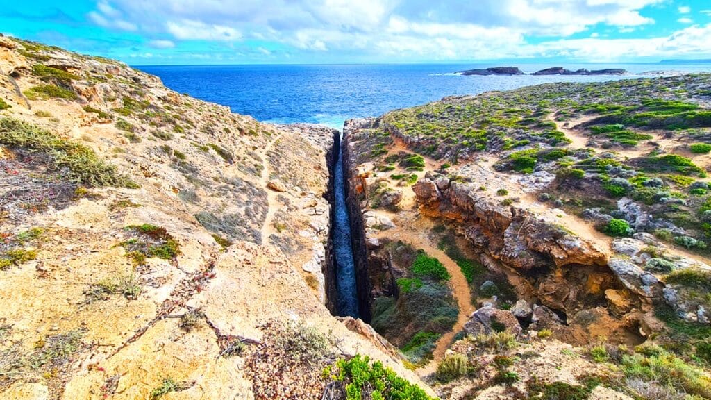 The intriguing Theakestone Crevasse, part of the scenery at Whalers Way